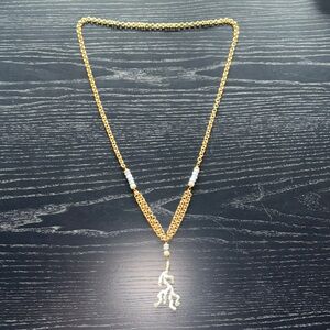 Elegant Gold and Silver Necklace